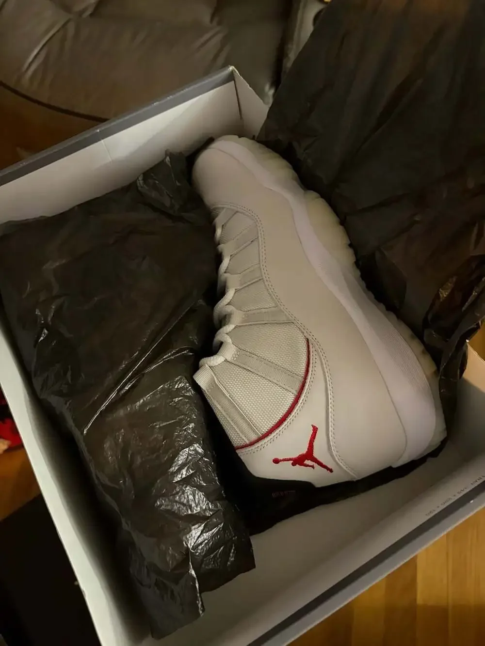 Air Jordan 11 Retro Platinum Tint Sneakers (378037-016)